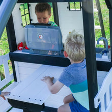 Load image into Gallery viewer, Backyard Discovery Canyon Creek Cedar Wood Swing Set with Wave Slide. Clubhouse. Play Kitchen. Picnic Area. Belt Swings. Web Swing. Rock Wall. Balconies. Playhouse. Step Ladder. Outdoor Playset