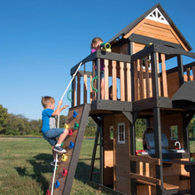 Load image into Gallery viewer, Backyard Discovery Canyon Creek Cedar Wood Swing Set with Wave Slide. Clubhouse. Play Kitchen. Picnic Area. Belt Swings. Web Swing. Rock Wall. Balconies. Playhouse. Step Ladder. Outdoor Playset